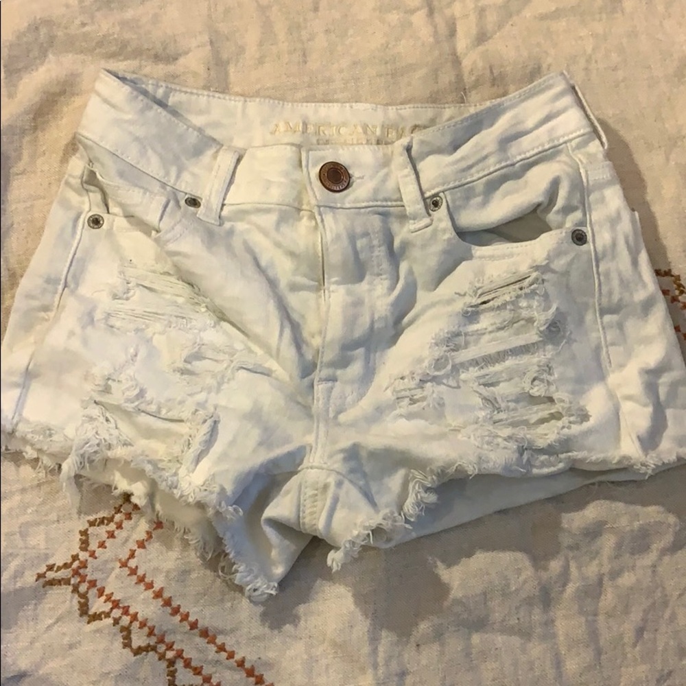 White ripped high waisted jean shorts